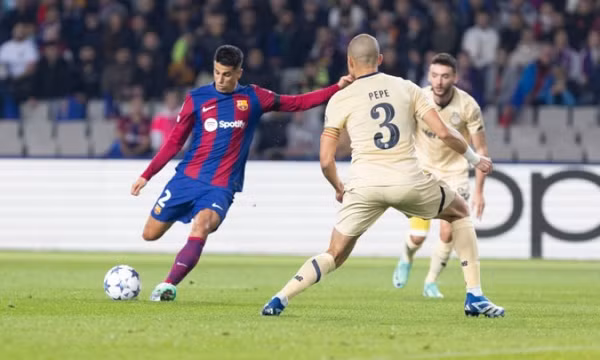 Cancelo, Felix đưa Barca vào vòng 1/8 Champions League