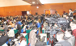 Hình ảnh các nhà báo tác nghiệp tại Đại hội XII của Đảng