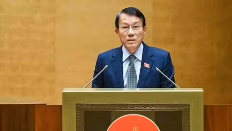 Bộ trưởng Công an Lương Tam Quang trình bày về dự án Luật Tổ chức cơ quan điều tra hình sự (sửa đổi). (Ảnh: DUY LINH)