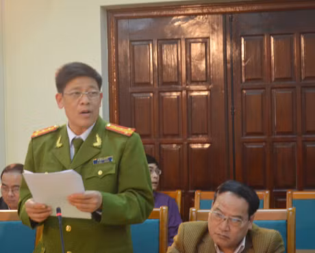 Đại tá Vũ Văn Dương, Phó Giám đốc PCCC Quảng Ninh báo cáo tình hình triển khai Tuần lễ Quốc gia về ATVSLĐ-PCCN tại ngành.
